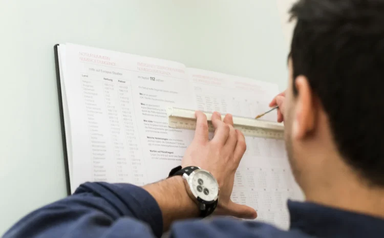 crop-man-underlining-data-notebook crop-man-underlining-data-notebook